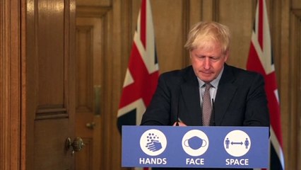 Boris Johnson gives a press conference to announce restrictions to social gatherings in England as Covid-19 cases rise