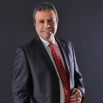 Opr. Dr. Candan Hundemir