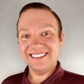 Aaron J. Holt
