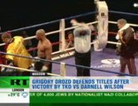 Russian boxer defends continental titles