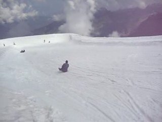 Neil Sledding on Mt. Titlus