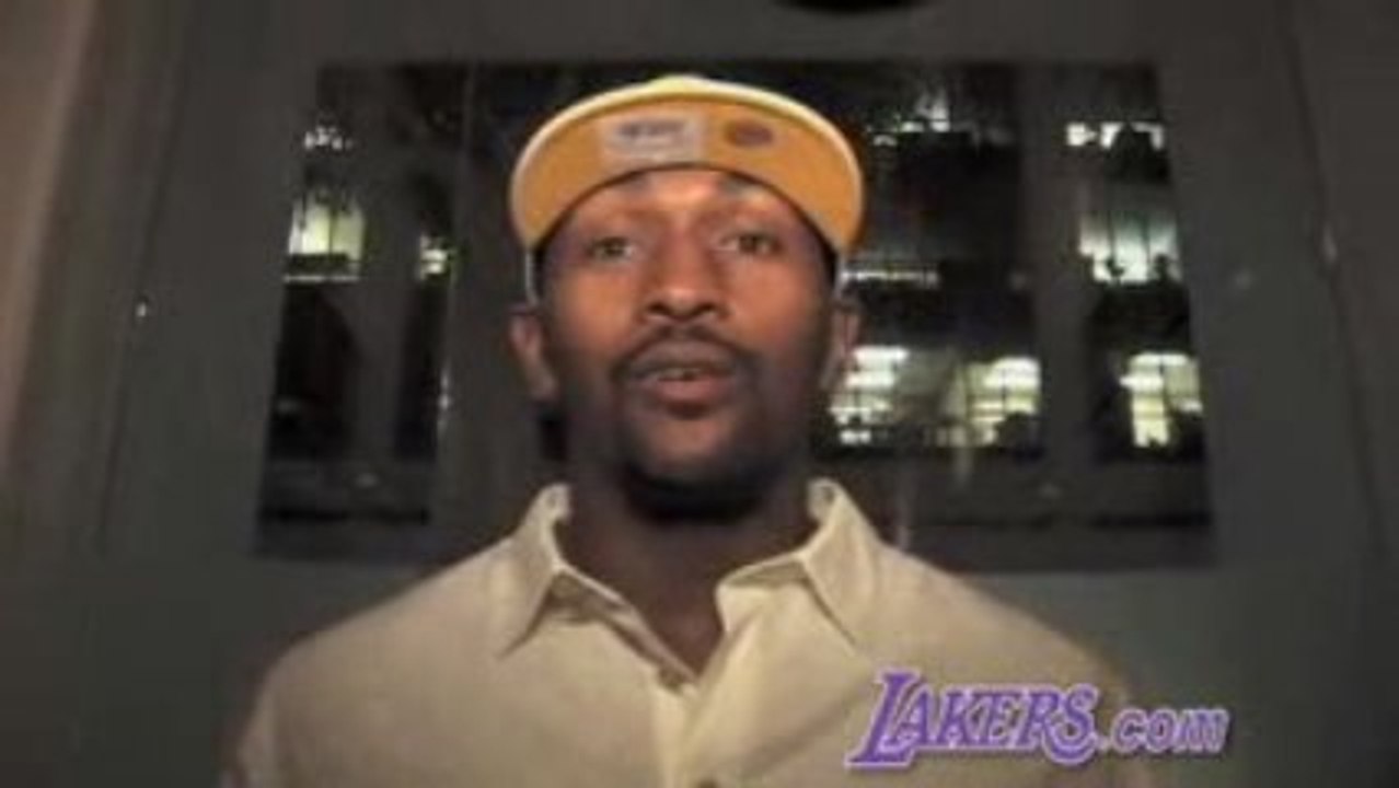 Ron Artest signing his contract to officially become a Laker
