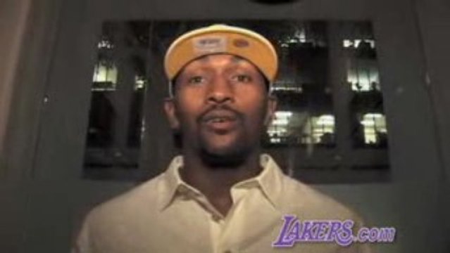Ron Artest signing his contract to officially become a Laker