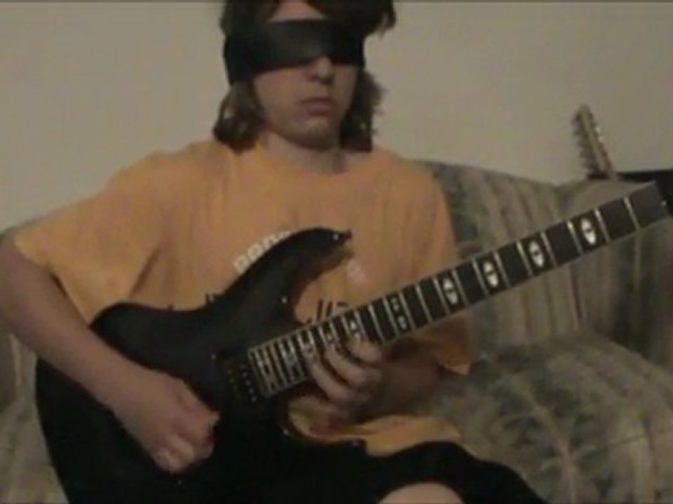 Blindfolded Kid Plays Bach on Guitar