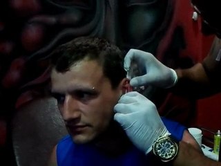 Industrial Ear Piercing by Aydın Akbel