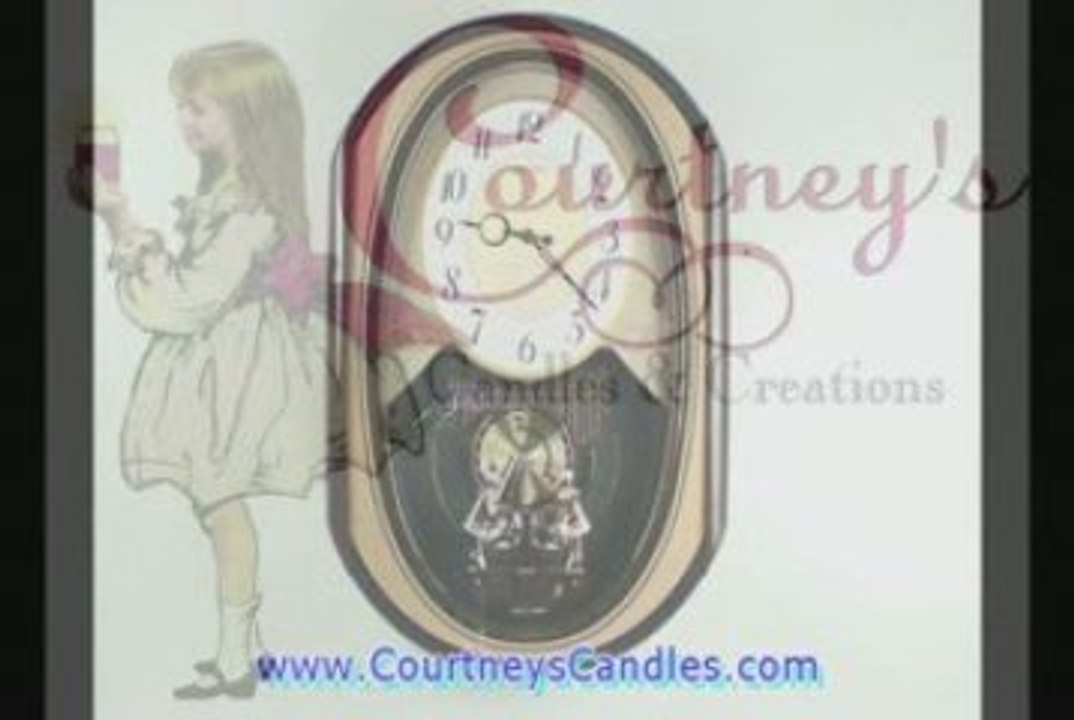 QXM214GRH SEIKO MELODIES IN MOTION MUSICAL CLOCK