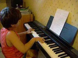 RAFFI ARTO 7 ANS - fats domino blue bery hill "piano"