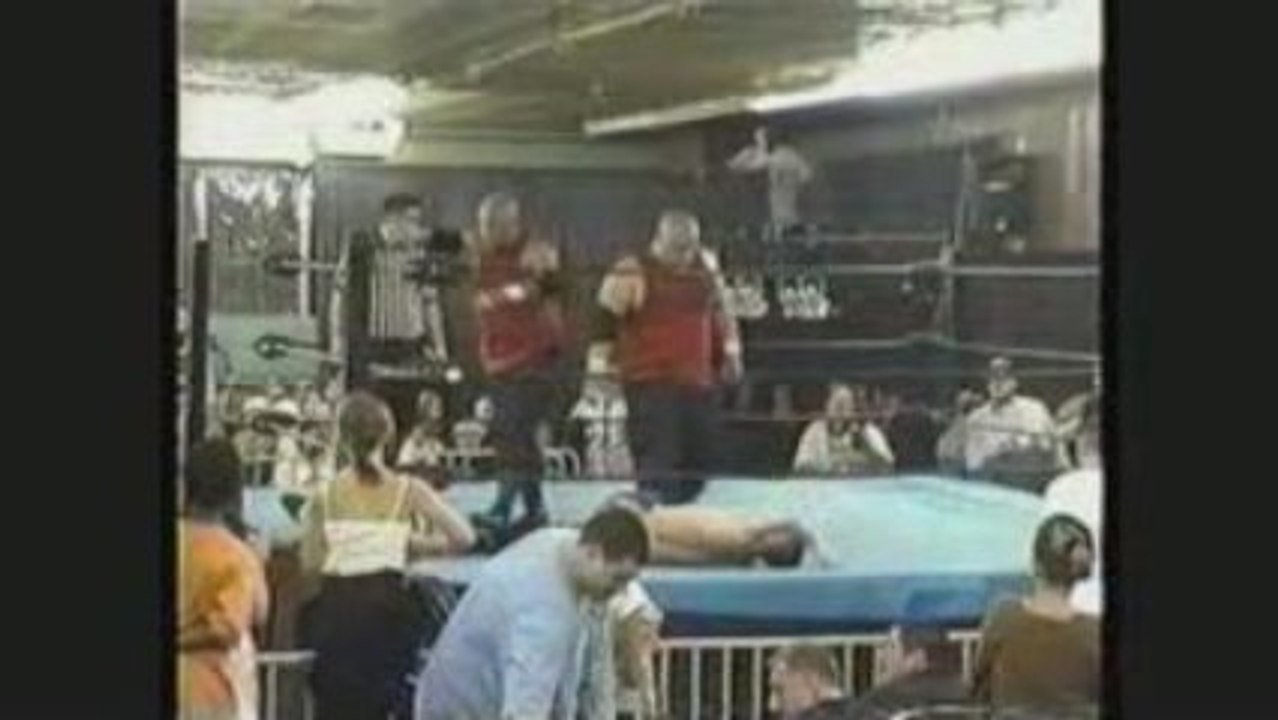 Pro Wrestlers Thrown Into A Wall From The Ring