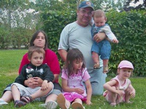 seance photo en famille dans un parc