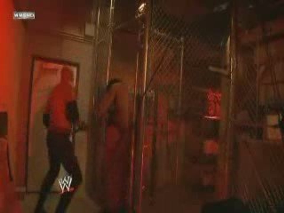 Kane attack the Great Khali in backstage