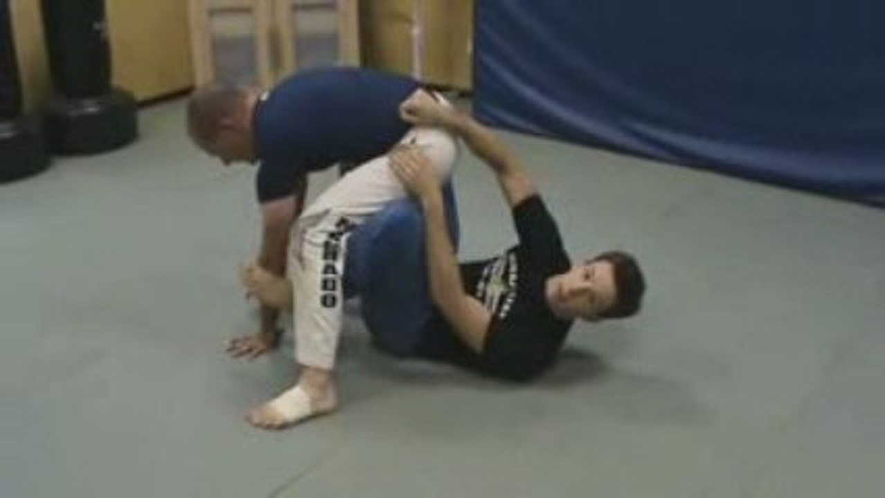 Taking the Back from X-Guard - Couch2Cage.com