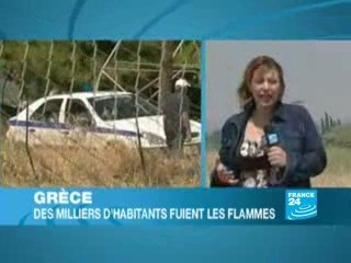 Ds milliers de Grecs fuient les flammes qui menacent Athènes