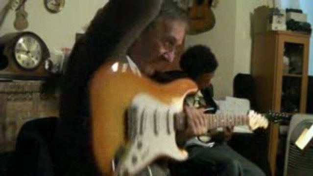 Ray Gallo Guitarist/teacher with a grade 3 Rockschool pupil