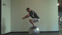 Standing on an Exercise Ball - Squat Hold on Stability Ball
