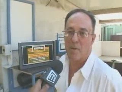 Une nîmois revisite le batardeau (Inondation Nîmes)