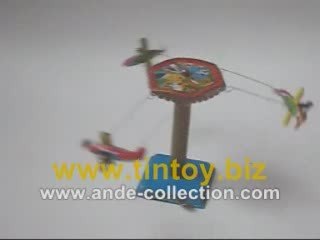 Tin Toy Wind Up Airplane Flying Swing Carousel MM089