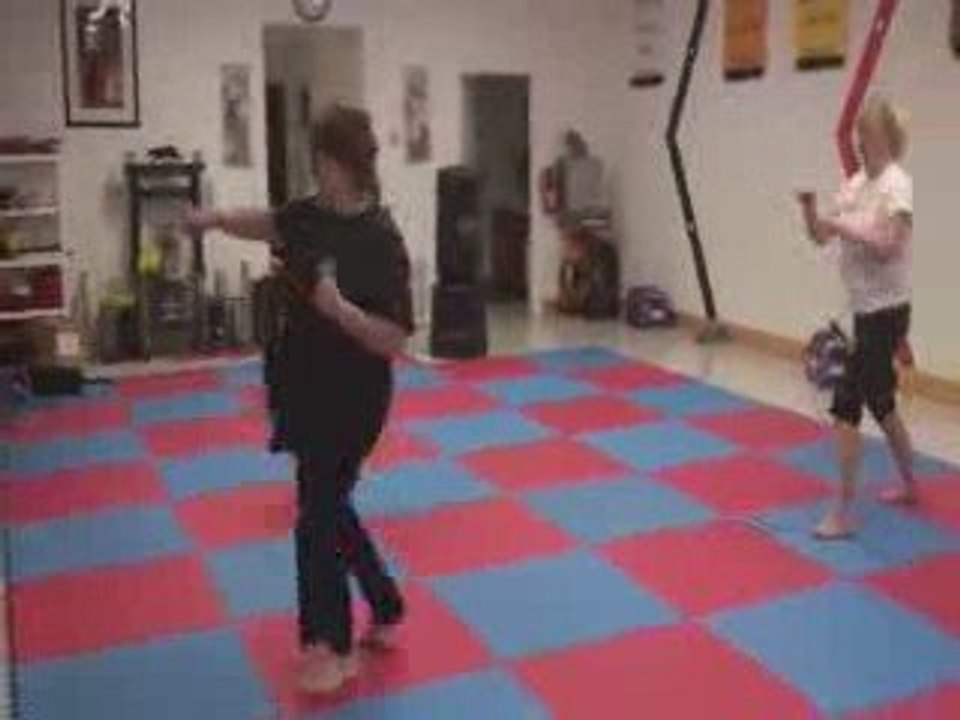 Taedwondo Kick Boxing Class with resistance bands