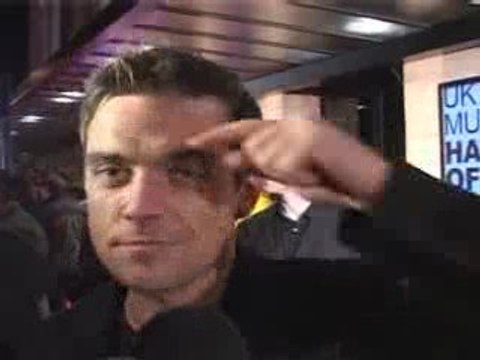 Robbie may rejoin Take That