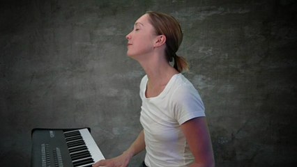 New talent Elizaveta sings her original "Rain," in Russian