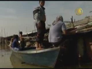 Flooded Philippine Village Struggles to Survive
