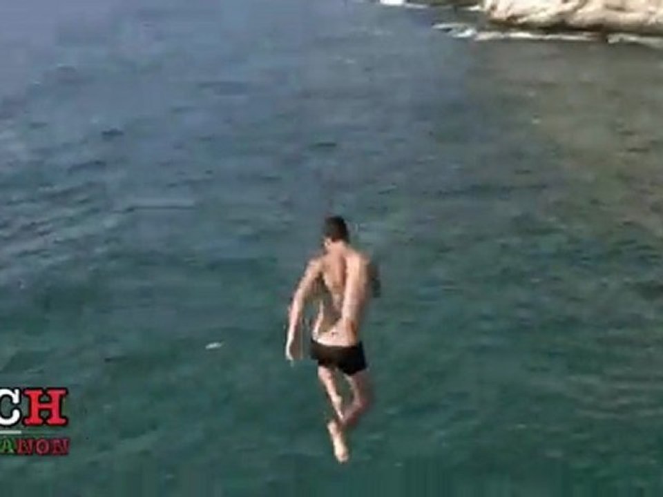 Lebanese Guys diving from the Raouche Rock Beirut 2009