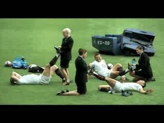 bmi stewardess performs with England rugby studs