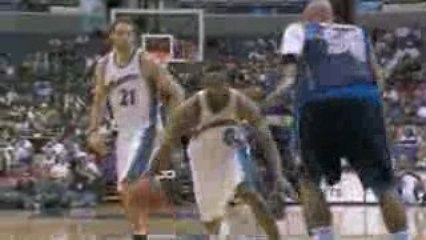 Gilbert Arenas bobs and weaves his way to the hoop.