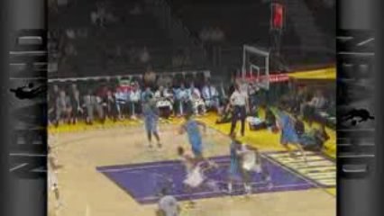 NBA Stephen Graham hooks up with Derrick Brown for the dunk.