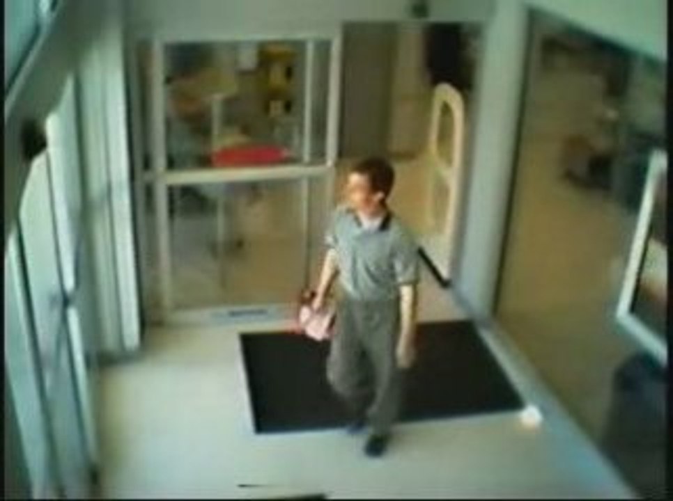 Dork runs into glass door