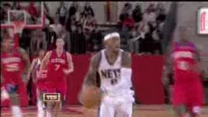 Terrence Williams slams the ball in with authority.