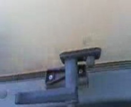 tracteur Claas ares 567 atz avec andaineur a pierre .