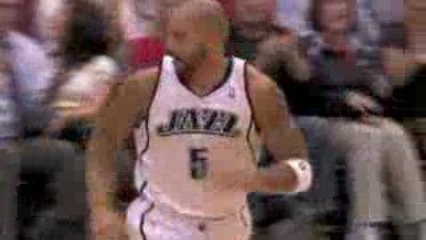 NBA Carlos Boozer scores 27 points and grabs 14 rebounds as