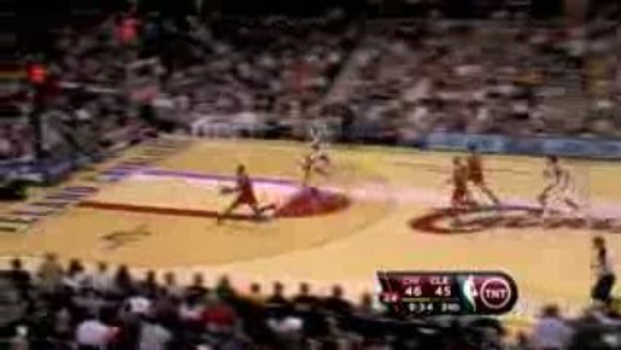 NBA Derrick Rose steals the ball.  He passes ahead to John S