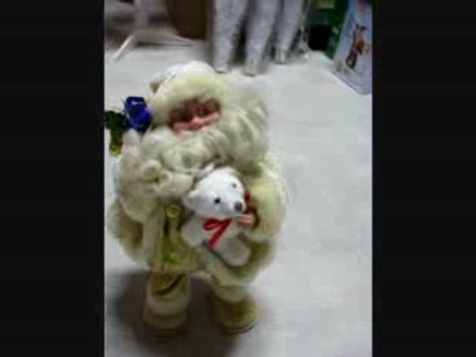 pere noel automate blanc danse et chante