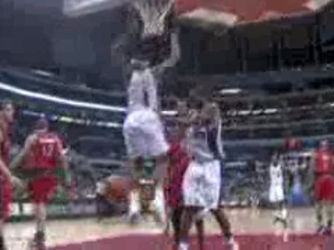 NBA Baron Davis throws down with two hands.