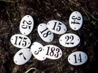 Classic white and black enamel signs