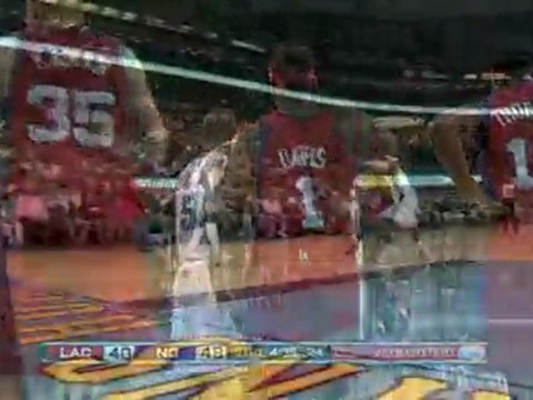 NBA Baron Davis drives to the basket, gets fouled and sinks