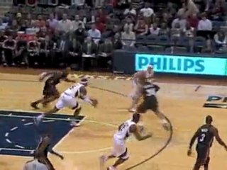 NBA Mike Bibby hustles down the court for the layup.