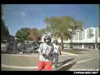 Motorcycle crashes into intersection!