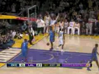 NBA Kobe goes over the backboard for the bucket and a foul.