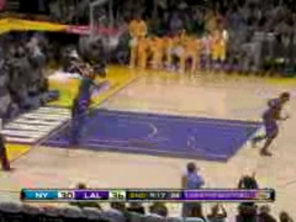 NBA Lamar Odom follows a missed shot with an impressive slam
