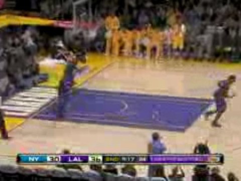 NBA Lamar Odom follows a missed shot with an impressive slam
