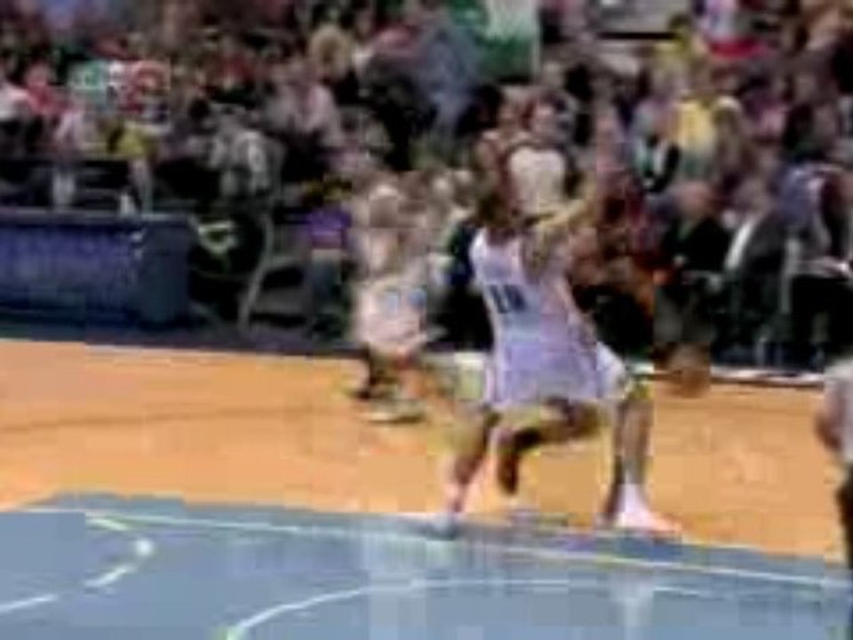 NBA Joakim Noah delivers a one- handed facial on Carlos Booz