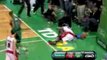 NBA Paul Pierce throws down a powerful dunk against a defens