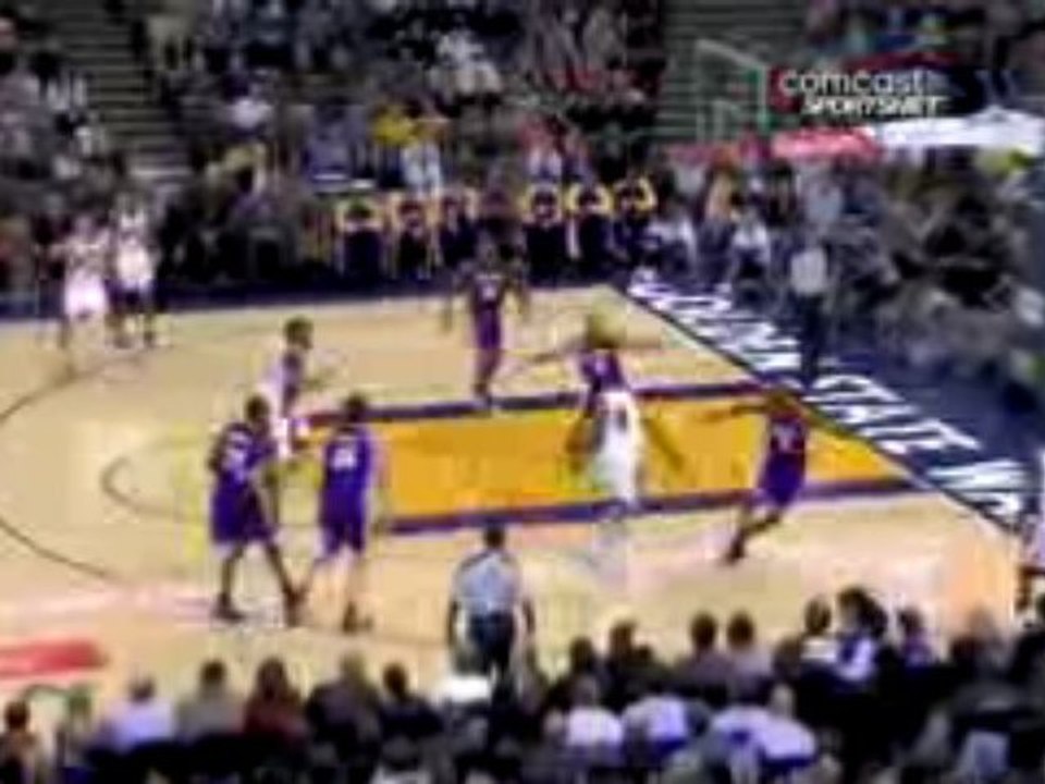 NBA Monta Ellis drives around Pau Gasol and gets the off-bal