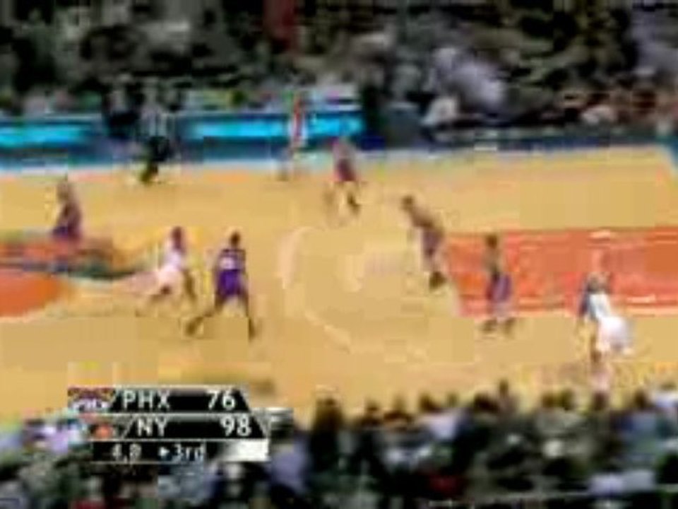 NBA Danilo Gallinari again denies a Suns player at the hoop.