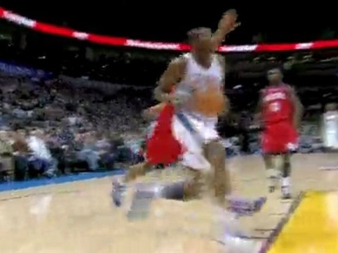 NBA Kevin Durant gets by Andre Iguodala for the strong finis
