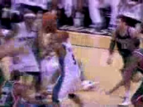 NBA Caron Butler splits the defense and finishes the slam wi