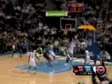 NBA Michael Beasley drives to the basket and sinks the tough