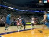 NBA Monta Ellis spins past a defender and sinks a tough layu